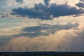 Turbines wind farm on background of dramatic evening ÃÂ  clouds